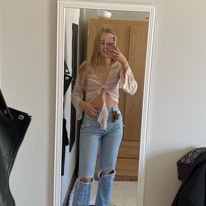 pink and white striped tie front long sleeve blouse